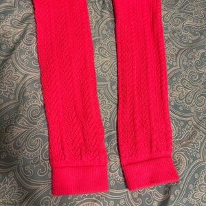Neon pink leg warmers